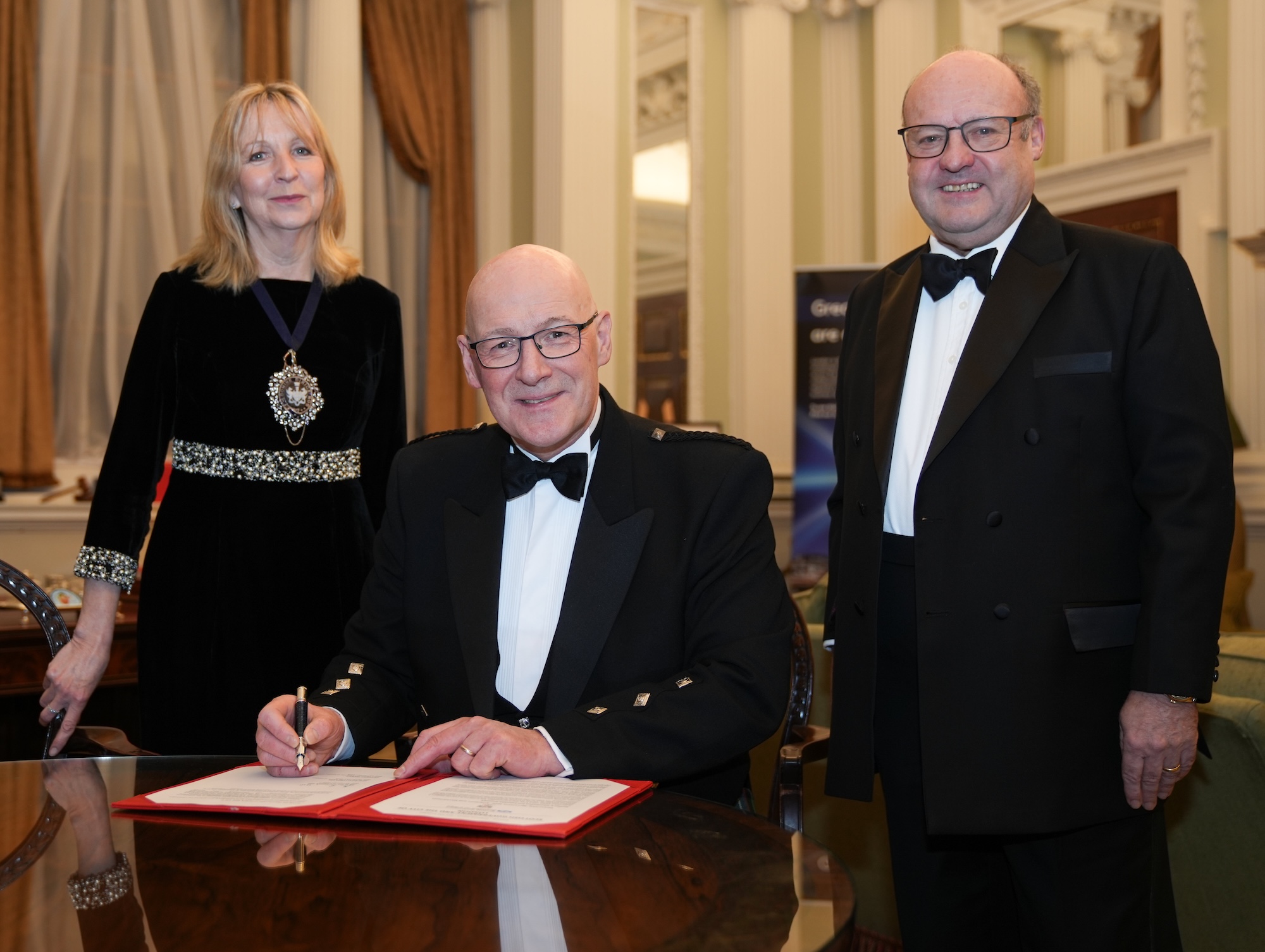 Swinney cements financial ties with City of London partnership